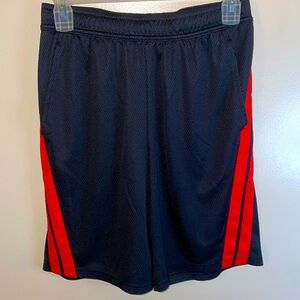 All In Motion mens size Small red and black shorts